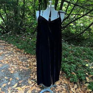 Plus-size black velvet dress with leg slit and adjustable straps